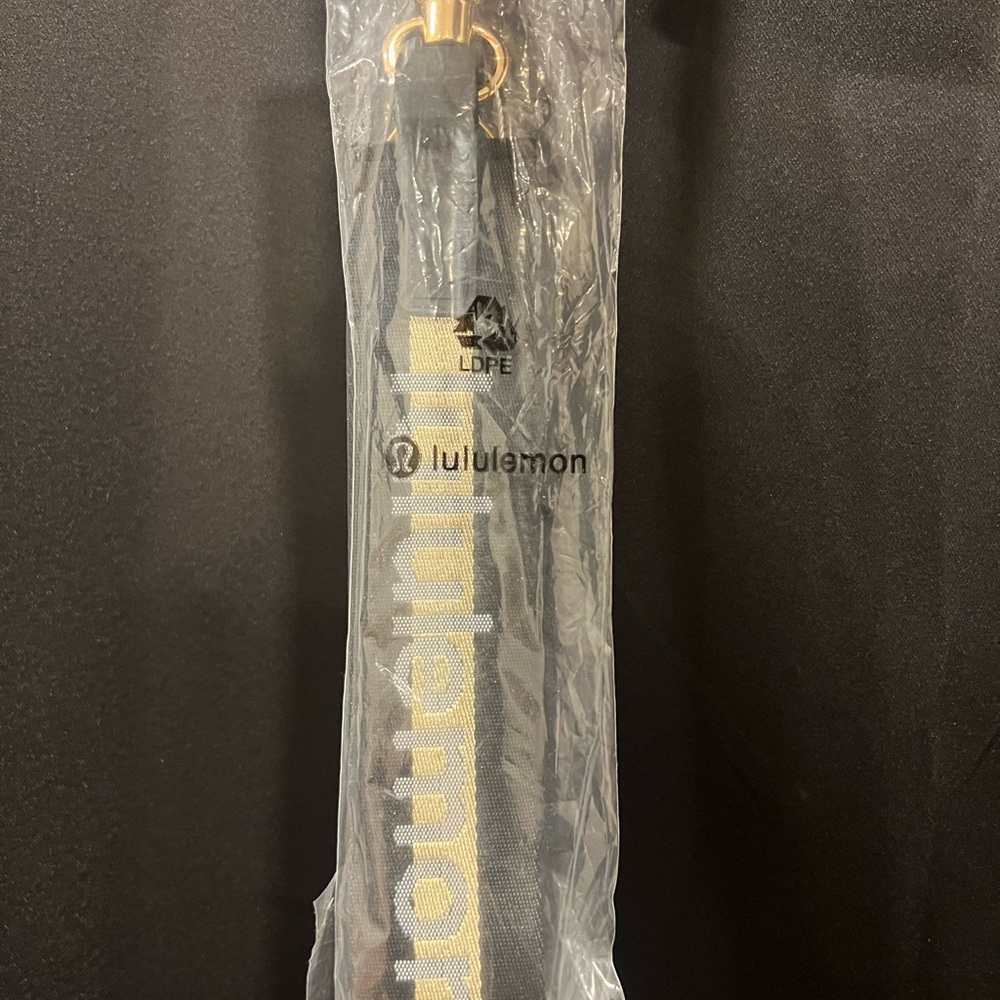 Lululemon Black and Gold Keychain